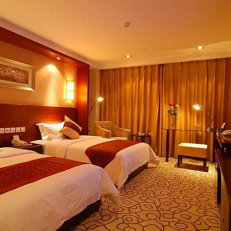 Dynasty International Hotel Kunming Kamer foto